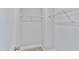 Walk-in closet with carpeted floors and metal shelving for ample storage at 757 Portland Rose Dr, Knightdale, NC 27545