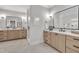 Modern bathroom with double vanity, stylish mirrors, and a spacious shower at 113 S Ennis St, Fuquay Varina, NC 27526