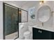 Modern bathroom featuring an elegant walk-in shower and sleek vanity at 113 S Ennis St, Fuquay Varina, NC 27526