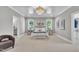 Spacious primary bedroom with tray ceilings, ensuite bathroom, and serene ambiance at 113 S Ennis St, Fuquay Varina, NC 27526