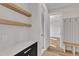 A pristine mudroom with built-in shelving, bench, and a quartz countertop at 113 S Ennis St, Fuquay Varina, NC 27526