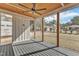 Cozy screened porch with ceiling fan overlooking a beautiful backyard at 113 S Ennis St, Fuquay Varina, NC 27526