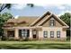 House rendering with brown roof and beige siding at 6021 Inverness Cir, Sanford, NC 27332