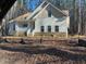 Craftsman style home with stone accents and a covered porch at 6021 Inverness Cir, Sanford, NC 27332
