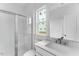 Bathroom featuring a glass-enclosed shower, white vanity, and modern fixtures at 929 Kinglet House Rd, Knightdale, NC 27545