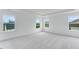 Bright bedroom features large windows and plush carpet flooring at 929 Kinglet House Rd, Knightdale, NC 27545