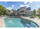 Luxury pool and patio with hot tub, pergola and fire pit at 133 Synandra Ln, Holly Springs, NC 27540