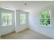 Bright bedroom with ample natural light and a neutral color palette at 2126 Opulent Oaks Ln # 14, Durham, NC 27713