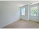 Spacious bedroom with large windows, and a neutral color palette at 2126 Opulent Oaks Ln # 14, Durham, NC 27713