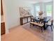 Elegant dining area with a modern table setting and tasteful decor with natural light from large windows at 2126 Opulent Oaks Ln # 14, Durham, NC 27713