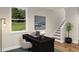 Home office with desk, laptop, and view of backyard at 2126 Opulent Oaks Ln # 14, Durham, NC 27713