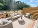 Cozy outdoor patio area featuring comfortable seating and a stylish rug, perfect for relaxation at 2126 Opulent Oaks Ln # 14, Durham, NC 27713