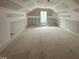 Finished attic space with a window at 7000 North Ridge Dr, Raleigh, NC 27615