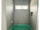 New bathroom featuring gray tiled walls, a shower niche, and a green tub at 7000 North Ridge Dr, Raleigh, NC 27615