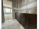 Bathroom in progress showing modern vanity in the foreground and a view of the room beyond at 7000 North Ridge Dr, Raleigh, NC 27615