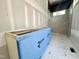 Under-construction bathroom showcasing a vanity and tiled shower at 7000 North Ridge Dr, Raleigh, NC 27615