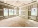 Spacious bedroom with large windows providing ample natural light, ready for personalization at 7000 North Ridge Dr, Raleigh, NC 27615