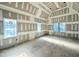 Bright bedroom under construction, with ample windows and a versatile space at 7000 North Ridge Dr, Raleigh, NC 27615