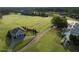 Aerial view of the expansive driving range on a manicured golf course at 7000 North Ridge Dr, Raleigh, NC 27615