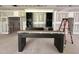 Spacious living room with a fireplace and built-in wine rack at 7000 North Ridge Dr, Raleigh, NC 27615