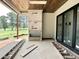 Outdoor living space with wood ceiling at 7000 North Ridge Dr, Raleigh, NC 27615