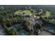 Aerial view of the tennis courts at the country club, close to the clubhouse at 7000 North Ridge Dr, Raleigh, NC 27615
