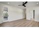 Bedroom with a ceiling fan, hardwood floors, and natural light at 90 Lambert Ln, Fuquay Varina, NC 27526