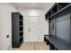 Mudroom with built-in storage, bench, and a coat rack at 90 Lambert Ln, Fuquay Varina, NC 27526