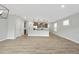 Open concept living space connecting the kitchen and living areas at 28 Nettle Ln # 235, Clayton, NC 27520