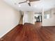 Spacious living area with wood floors flowing into the kitchen, plenty of natural light at 330 Gilman Ln # 106, Raleigh, NC 27610