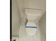 Close-up of a toilet featuring a two-piece design and marble-look tile flooring at 330 Gilman Ln # 106, Raleigh, NC 27610