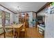 Dining area with wooden table and hutch at 118 W Silver Belle Dr, Zebulon, NC 27597