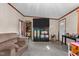 Living room with brown couch and entertainment center at 118 W Silver Belle Dr, Zebulon, NC 27597