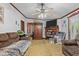 Living room with two sofas and built-in shelving at 118 W Silver Belle Dr, Zebulon, NC 27597