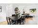 Dining room features stylish decor, hardwood floors, and natural light from a nearby window at 1511 Malta Ave, Raleigh, NC 27610