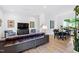 Bright open concept living room with hardwood floors and stylish decor at 1511 Malta Ave, Raleigh, NC 27610