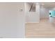 Bright entryway showcasing hardwood floors, staircase, and access to the open-concept living area at 3181 Mission Olive Pl # 346, New Hill, NC 27562