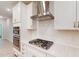 Modern kitchen features stainless steel appliances, white cabinets and subway tile backsplash at 3181 Mission Olive Pl # 346, New Hill, NC 27562