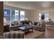 Inviting living room featuring comfortable sofas, a coffee table and bright windows, perfect for relaxation and gatherings at 222 Chestnut Oak Ln, Lillington, NC 27546