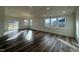 Bright living room with hardwood floors, abundant natural light, creating a bright and welcoming space at 222 Chestnut Oak Ln, Lillington, NC 27546