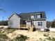 New construction featuring gray siding, new deck, and double pane windows at 1681 S Old Carriage Rd, Rocky Mount, NC 27804