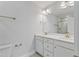 Bright bathroom with double vanity, white cabinetry, and ample counter space at 2038 Fishamble St, Fuquay Varina, NC 27526