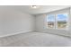 Cozy bedroom with natural light and a view of the outside at 2038 Fishamble St, Fuquay Varina, NC 27526