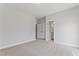 Spacious bedroom offering carpet floors, a large closet, and access to the bathroom at 2038 Fishamble St, Fuquay Varina, NC 27526