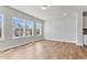 Spacious living room featuring hardwood floors and plenty of natural light at 2038 Fishamble St, Fuquay Varina, NC 27526