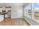 Open concept living room with kitchen view, abundant natural light, and modern finishes at 2038 Fishamble St, Fuquay Varina, NC 27526