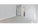 Bright and spacious bedroom with carpet floors, showing a closet and connecting bathroom at 2042 Fishamble St # 32, Fuquay Varina, NC 27526