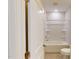 Bathroom featuring a white tub shower combo with tiled floor, toilet and vanity at 2337 Bay Minette Sta # 553, Apex, NC 27502