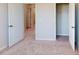 Inviting bedroom offering closet and hallway access, with plush carpeting for added comfort at 2337 Bay Minette Sta # 553, Apex, NC 27502