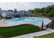 Aerial view of community pool with a clubhouse at 2337 Bay Minette Sta # 553, Apex, NC 27502